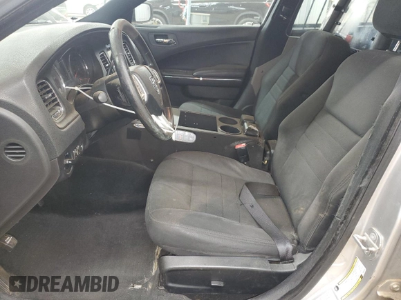 2013 Dodge Charger Police with VIN 2C3CDXAT6DH642327, listed as a Copart auction lot 50945865 with 179,229 mi miles and Salvage Title. Bid and sale history available at DreamBid. Image 7.