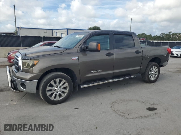 2012 Toyota Tundra z VIN 5TFDW5F14CX216264, wystawiony jako Copart lot #60983285 z przebiegiem 186 869 mil mil oraz Szkoda całkowita • Salvage title. Historia ofert i sprzedaży dostępna na DreamBid. Obrazek 1.