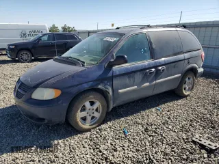 2005 Dodge Caravan SXT with VIN 1D4GP45R45B240417, listed as a Copart auction lot 60478945 with 115,512 mi miles and Salvage title. Bid and sale history available at DreamBid. Image 1.