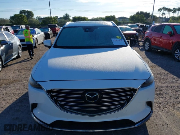 2019 Mazda CX-9 Grand Touring with VIN JM3TCADY3K0305173, listed as a IAAI auction lot 41672448 with 132,265 mi miles. Bid and sale history available at carsss.com. Image 12.