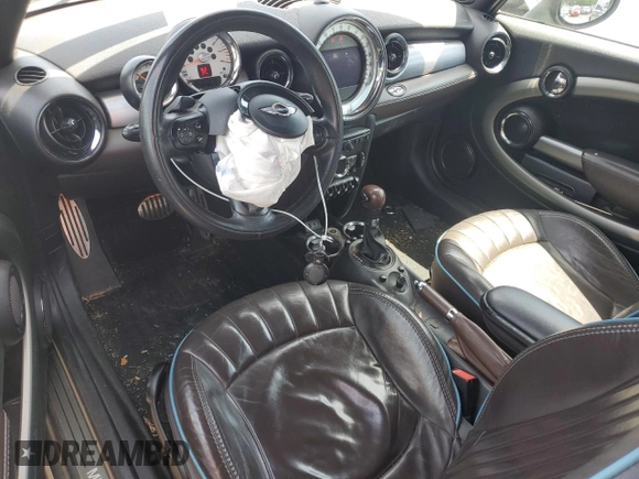 2013 MINI Convertible S with VIN WMWZP3C51DT551373, listed as a Copart auction lot 57878745 with 110,181 mi miles and Salvage title. Bid and sale history available at DreamBid. Image 8.