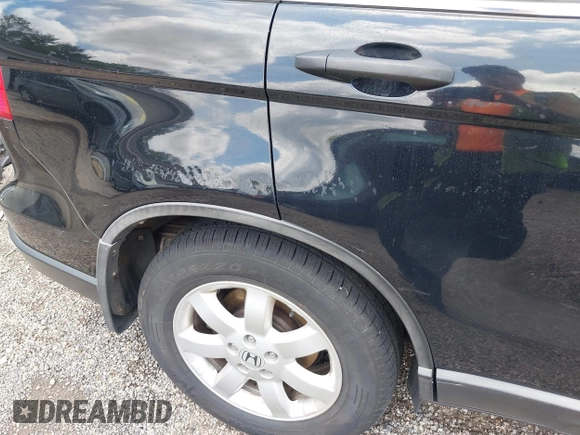 2009 Honda CR-V EX z VIN 5J6RE48519L068152, wystawiony jako IAAI lot #42373355 z przebiegiem 167 698 mil mil oraz . Historia ofert i sprzedaży dostępna na DreamBid. Obrazek 19.