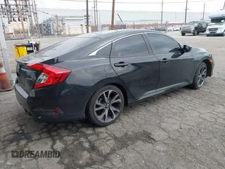 2020 Honda Civic Sedan Sport with VIN 2HGFC2F82LH592254, listed as a IAAI auction lot 41903524 with 69,221 mi miles. Bid and sale history available at carsss.com. Image 4.
