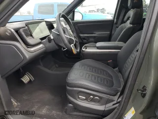 2023 Rivian R1S Launch Edition with VIN 7PDSGABL6PN022754, listed as a Copart auction lot 76849534 with 1,576 mi miles and Salvage Title. Bid and sale history available at carsss.com. Image 7.