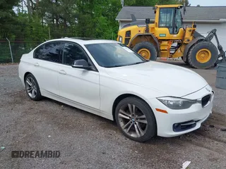 2013 BMW 3 Series 328i xDrive with VIN WBA3B3C50DJ810290, listed as a IAAI auction lot 42188744 with 137,493 mi miles and . Bid and sale history available at DreamBid. Image 1.