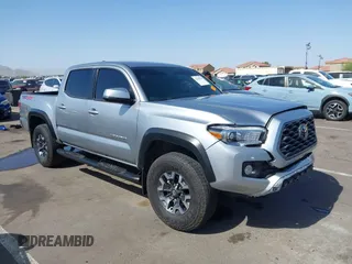 2022 Toyota Tacoma SR z VIN 3TMCZ5AN7NM515446, wystawiony jako IAAI lot #42258744 z przebiegiem 13 464 mil mil oraz . Historia ofert i sprzedaży dostępna na DreamBid. Obrazek 1.