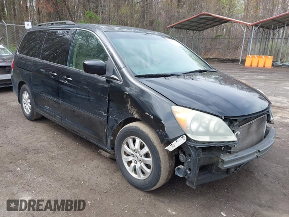 2009 Honda Odyssey EX-L with VIN 5FNRL387X9B051750, listed as a IAAI auction lot 41953221 with 205,142 mi miles. Bid and sale history available at carsss.com. Image 1.
