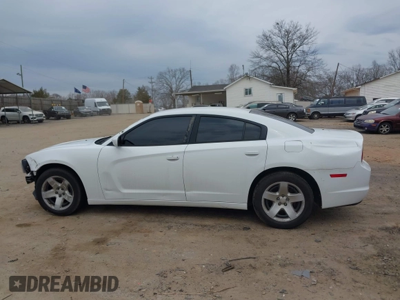 2013 Dodge Charger Police with VIN 2C3CDXAG6DH555241, listed as a IAAI auction lot 41681180 with 203,035 mi miles and . Bid and sale history available at DreamBid. Image 17.