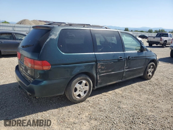 2000 Honda Odyssey EX z VIN 2HKRL1867YH587616, wystawiony jako Copart lot #57258795 z przebiegiem 219 999 mil mil oraz Szkoda całkowita • Salvage title. Historia ofert i sprzedaży dostępna na DreamBid. Obrazek 3.