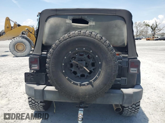 2016 Jeep Wrangler Unlimited Sport с VIN 1C4BJWDG2GL265592, выставлен на аукционе Copart как лот 56429725 с пробегом 106 884 миль миль и Списание • Salvage title. История ставок и продаж доступна на DreamBid. Изображение 6.