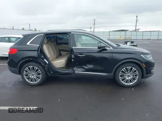 2017 Lincoln MKX Reserve with VIN 2LMPJ8LR7HBL30488, listed as a IAAI auction lot 42294191 with 64,246 mi miles and . Bid and sale history available at DreamBid. Image 14.