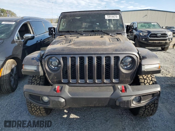 2023 Jeep Gladiator Rubicon с VIN 1C6JJTBGXPL574702, выставлен на аукционе Copart как лот 75914474 с пробегом 10 506 миль миль и Списание • Salvage title. История ставок и продаж доступна на DreamBid. Изображение 5.