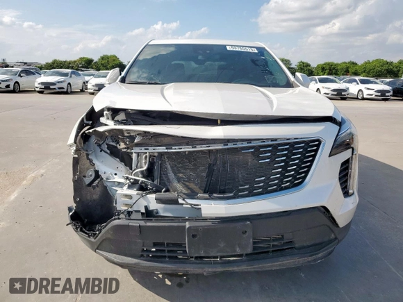 2021 Cadillac XT4 FWD Luxury z VIN 1GYAZAR49MF084676, wystawiony jako Copart lot #59765515 z przebiegiem 32 480 mil mil oraz Czysty tytuł • Clean title. Historia ofert i sprzedaży dostępna na DreamBid. Obrazek 5.