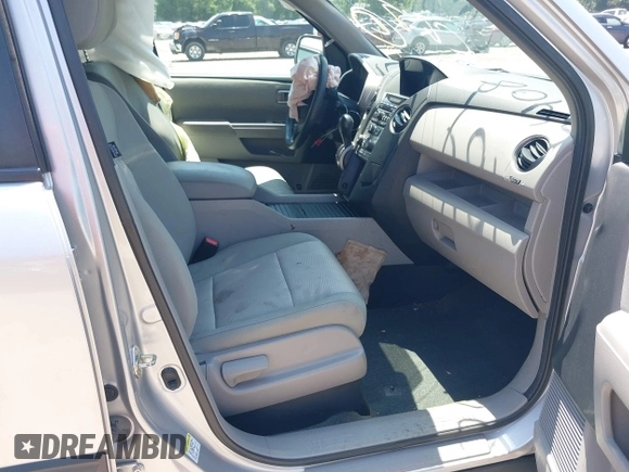 2014 Honda Pilot LX with VIN 5FNYF4H22EB024677, listed as a IAAI auction lot 42645408 with 133,271 mi miles and . Bid and sale history available at DreamBid. Image 5.