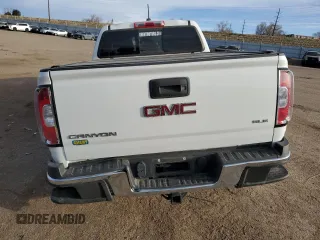 2017 GMC Canyon 4WD SLE z VIN 1GTG6CENXH1143837, wystawiony jako Copart lot #49699225 z przebiegiem 78 865 mil mil oraz Szkody całkowita. Historia ofert i sprzedaży dostępna na DreamBid. Obrazek 6.
