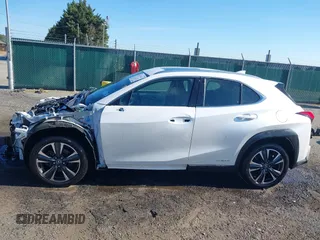 2021 Lexus UX with VIN JTHP9JBH5M2053797, listed as a IAAI auction lot 40718103 with 57,366 mi miles. Bid and sale history available at carsss.com. Image 15.