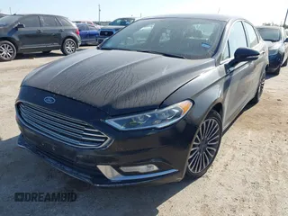 2017 Ford Fusion Titanium with VIN 3FA6P0K9XHR118057, listed as a IAAI auction lot 41982261 with 151,704 mi miles. Bid and sale history available at carsss.com. Image 2.