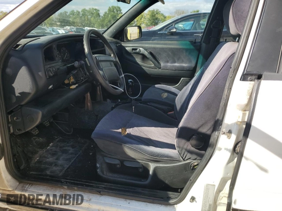 1997 Volkswagen Passat with VIN WVWGG83A0VB009323, listed as a Copart auction lot 73042334 with 261,740 mi miles and Salvage title. Bid and sale history available at DreamBid. Image 7.