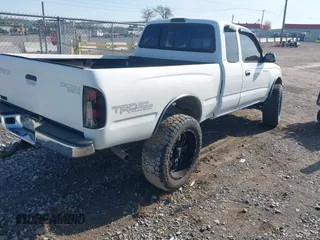 2000 Toyota Tacoma with VIN 5TEWN72N1YZ690947, listed as a IAAI auction lot 41951521 with 207,119 mi miles and . Bid and sale history available at DreamBid. Image 4.