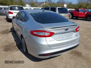 2014 Ford Fusion Titanium Hybrid with VIN 3FA6P0RU9ER147443, listed as a IAAI auction lot 41739540 with 146,359 mi miles. Bid and sale history available at carsss.com. Image 3.