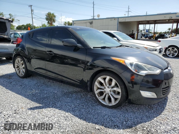 2013 Hyundai Veloster w/Gray Int with VIN KMHTC6AD0DU146529, listed as a Copart auction lot 62612425 with 128,554 mi miles and Clean title. Bid and sale history available at DreamBid. Image 4.