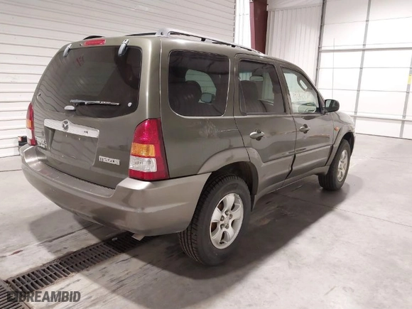 2002 Mazda Tribute LX with VIN 4F2YU08192KM65677, listed as a IAAI auction lot 41881715 with 131,837 mi miles. Bid and sale history available at carsss.com. Image 4.