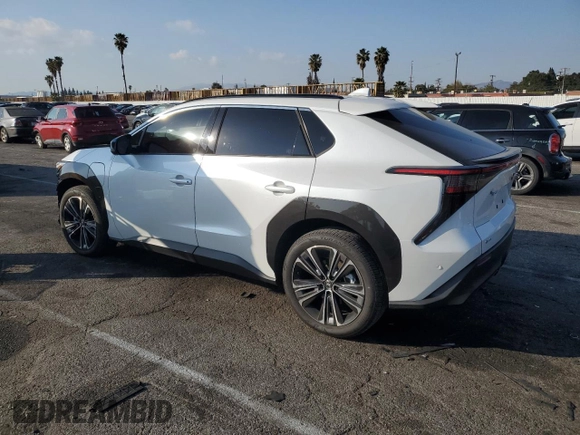 2024 Toyota bZ4X XLE with VIN JTMABACA6RA065029, listed as a Copart auction lot 43008655 with 15,489 mi miles and Salvage Title. Bid and sale history available at DreamBid. Image 2.