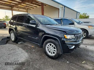 2020 Jeep Grand Cherokee Laredo E with VIN 1C4RJEAG7LC113542, listed as a Copart auction lot 62715585 with 64,124 mi miles and Salvage title. Bid and sale history available at DreamBid. Image 4.