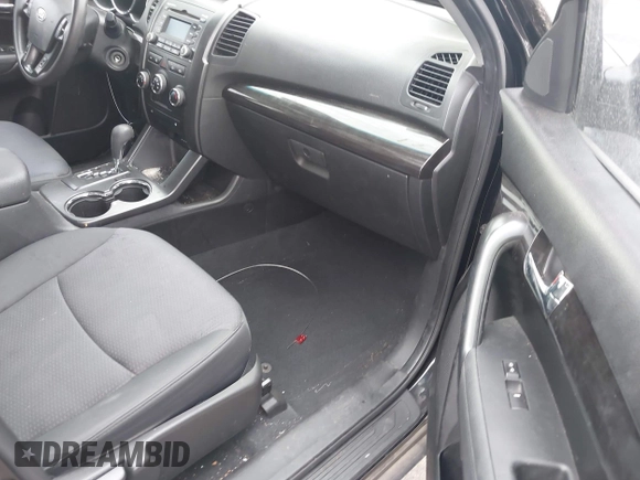 2012 Kia Sorento LX with VIN 5XYKT3A6XCG247528, listed as a IAAI auction lot 42194338 with 123,565 mi miles and . Bid and sale history available at carsss.com. Image 5.