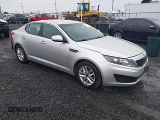 2011 Kia Optima LX z VIN KNAGM4A7XB5145958, wystawiony jako IAAI lot #41713152 z przebiegiem 91 155 mil mil oraz . Historia ofert i sprzedaży dostępna na DreamBid. Obrazek 1.