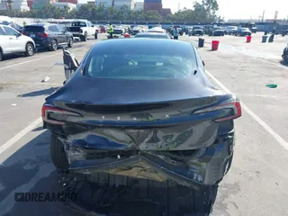 2024 Tesla Model 3 with VIN 5YJ3E1EA7RF717855, listed as a IAAI auction lot 41838814 with 8,750 mi miles and . Bid and sale history available at DreamBid. Image 16.