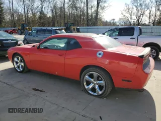 2013 Dodge Challenger R/T with VIN 2C3CDYBTXDH728695, listed as a Copart auction lot 42777345 with 140,696 mi miles and Salvage Title. Bid and sale history available at carsss.com. Image 2.