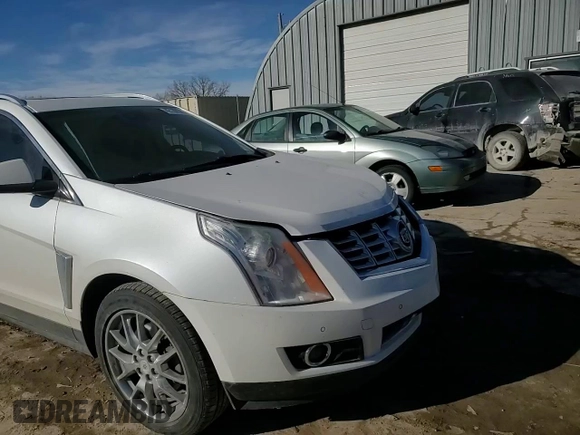 2015 Cadillac SRX Premium Collection with VIN 3GYFNGE35FS546957, listed as a Copart auction lot 42189045 with 100,079 mi miles and Salvage Title. Bid and sale history available at carsss.com. Image 11.