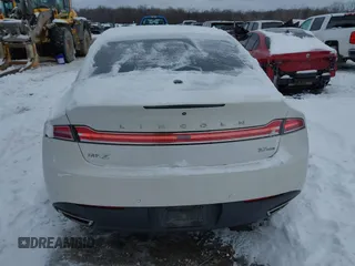 2015 Lincoln MKZ с VIN 3LN6L2JK2FR603436, выставлен на аукционе IAAI как лот 41598218 с пробегом 107 059 миль миль и . История ставок и продаж доступна на DreamBid. Изображение 16.
