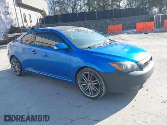 2010 Scion tC with VIN JTKDE3B78A0315248, listed as a IAAI auction lot 41442648 with 125,037 mi miles. Bid and sale history available at carsss.com. Image 1.
