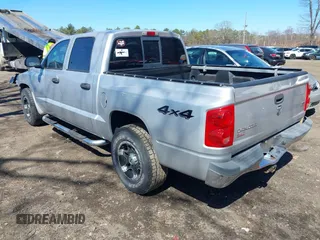 2006 Dodge Dakota SLT z VIN 1D7HW48N76S507358, wystawiony jako IAAI lot #41876899 z przebiegiem 131 880 mil mil oraz . Historia ofert i sprzedaży dostępna na DreamBid. Obrazek 3.