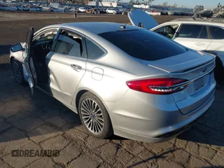 2017 Ford Fusion Hybrid Titanium with VIN 3FA6P0RU8HR190482, listed as a IAAI auction lot 41322244 with 137,539 mi miles and . Bid and sale history available at DreamBid. Image 3.