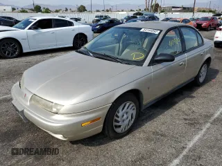 1999 Saturn SL with VIN 1G8ZK5275XZ262816, listed as a Copart auction lot 54144092 with 60,424 mi miles and Salvage title. Bid and sale history available at DreamBid. Image 2.