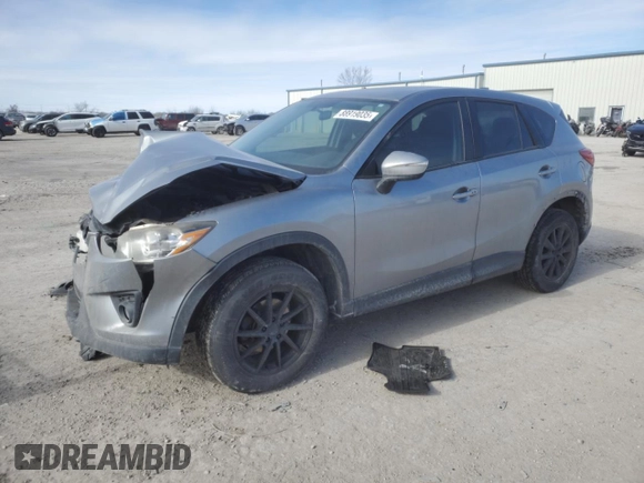 2015 Mazda CX-5 Touring with VIN JM3KE4CY4F0467571, listed as a Copart auction lot 88919035 with 197,755 mi miles and Salvage Title. Bid and sale history available at carsss.com. Image 1.