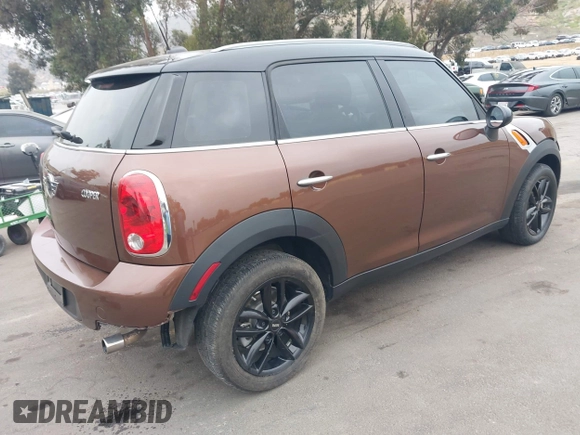2013 MINI Countryman with VIN WMWZB3C56DWM09484, listed as a IAAI auction lot 42039954 with 37,264 mi miles and . Bid and sale history available at DreamBid. Image 4.