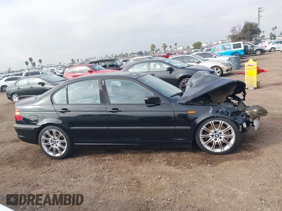 2005 BMW 3 Series 330i with VIN WBAEV53415KM08390, listed as a IAAI auction lot 41507259 with 192,211 mi miles. Bid and sale history available at carsss.com. Image 13.