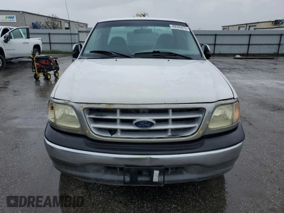 2002 Ford F-150 XL with VIN 1FTRF17W12NB04640, listed as a Copart auction lot 49535475 with 306,294 mi miles and Clean Title. Bid and sale history available at carsss.com. Image 5.