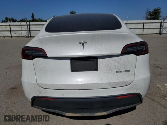 2022 Tesla Model Y Performance with VIN 7SAYGDEF9NF392197, listed as a Copart auction lot 57259105 with 43,400 mi miles and Salvage title. Bid and sale history available at DreamBid. Image 6.