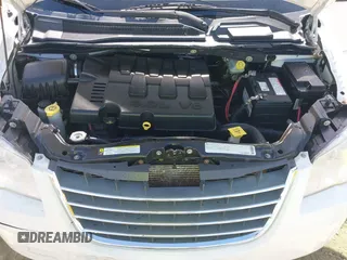 2009 Chrysler Town & Country Touring with VIN 2A8HR54X89R642118, listed as a IAAI auction lot 41844247 with 161,651 mi miles and . Bid and sale history available at DreamBid. Image 10.