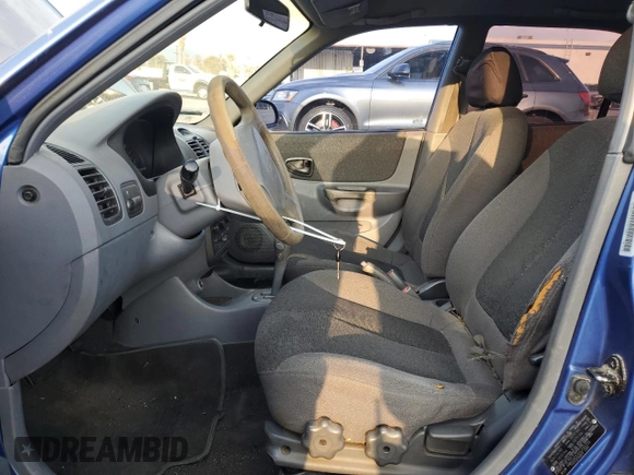 2001 Hyundai Accent GL with VIN KMHCG45C91U195735, listed as a Copart auction lot 80950554 with 164,176 mi miles and Salvage Title. Bid and sale history available at carsss.com. Image 7.