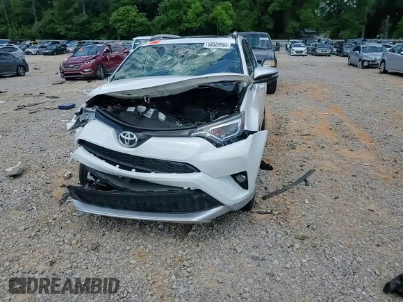 2016 Toyota RAV4 SE with VIN JTMNFREVXGD086661, listed as a Copart auction lot 58528965 with 70,523 mi miles and Salvage title. Bid and sale history available at DreamBid. Image 14.