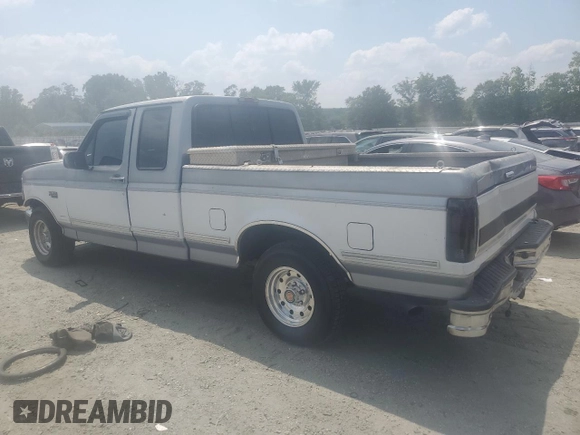 1994 Ford F-150 with VIN 1FTEX15N2RKB11632, listed as a Copart auction lot 59560045 with 276,828 mi miles and Salvage title. Bid and sale history available at DreamBid. Image 2.