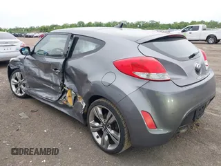 2012 Hyundai Veloster w/Gray Int z VIN KMHTC6AD3CU069427, wystawiony jako IAAI lot #42292476 z przebiegiem 166 960 mil mil oraz . Historia ofert i sprzedaży dostępna na DreamBid. Obrazek 3.
