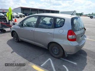 2008 Honda Fit with VIN JHMGD38438S030619, listed as a IAAI auction lot 42010052 with 147,588 mi miles. Bid and sale history available at carsss.com. Image 3.