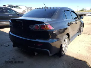 2015 Mitsubishi Lancer Evolution MR z VIN JA32W5FV5FU006111, wystawiony jako Copart lot #68985683 z przebiegiem 54 774 mil mil oraz . Historia ofert i sprzedaży dostępna na DreamBid. Obrazek 3.